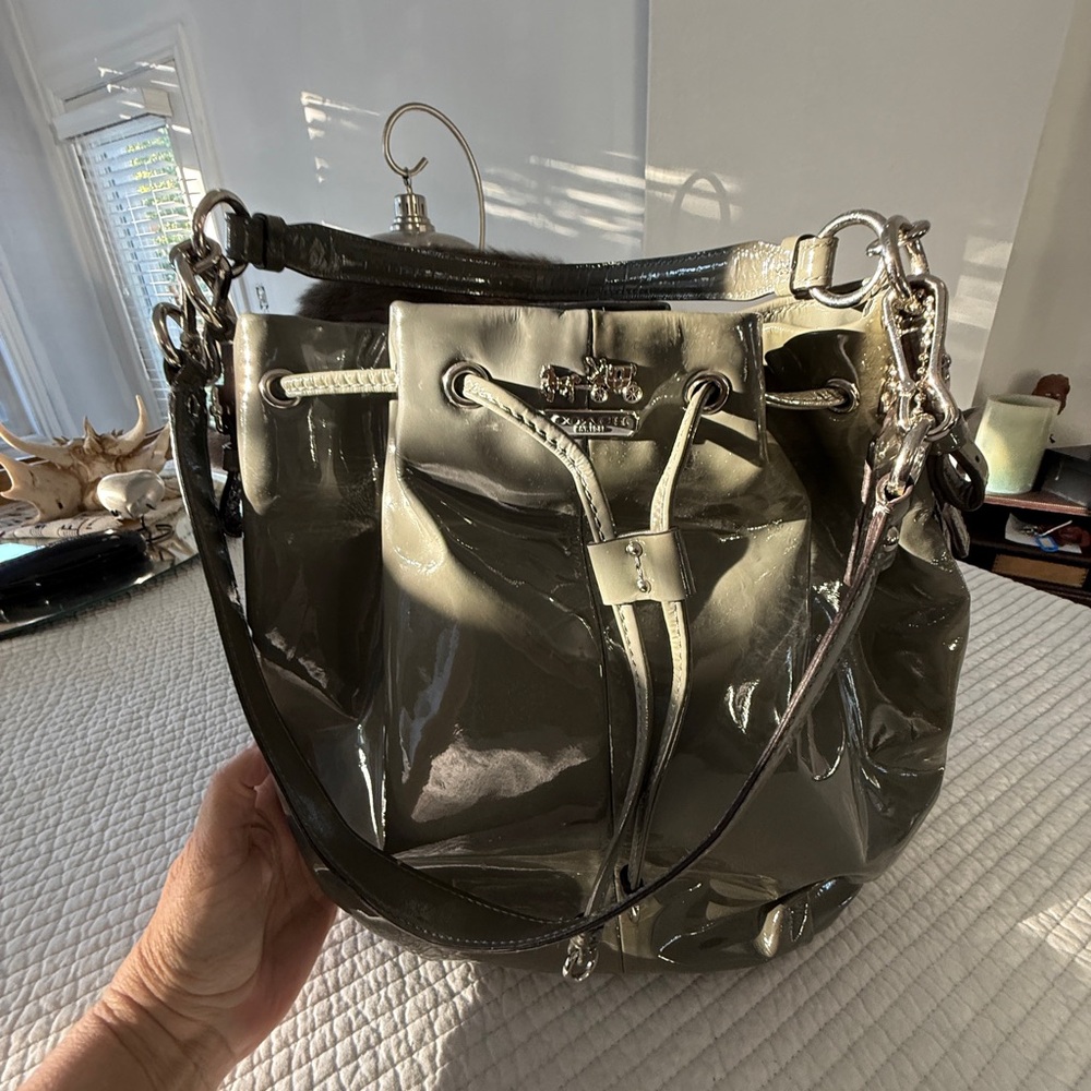 Coach gunmetal grey patent leather bucket bag cinch top shoulder strap